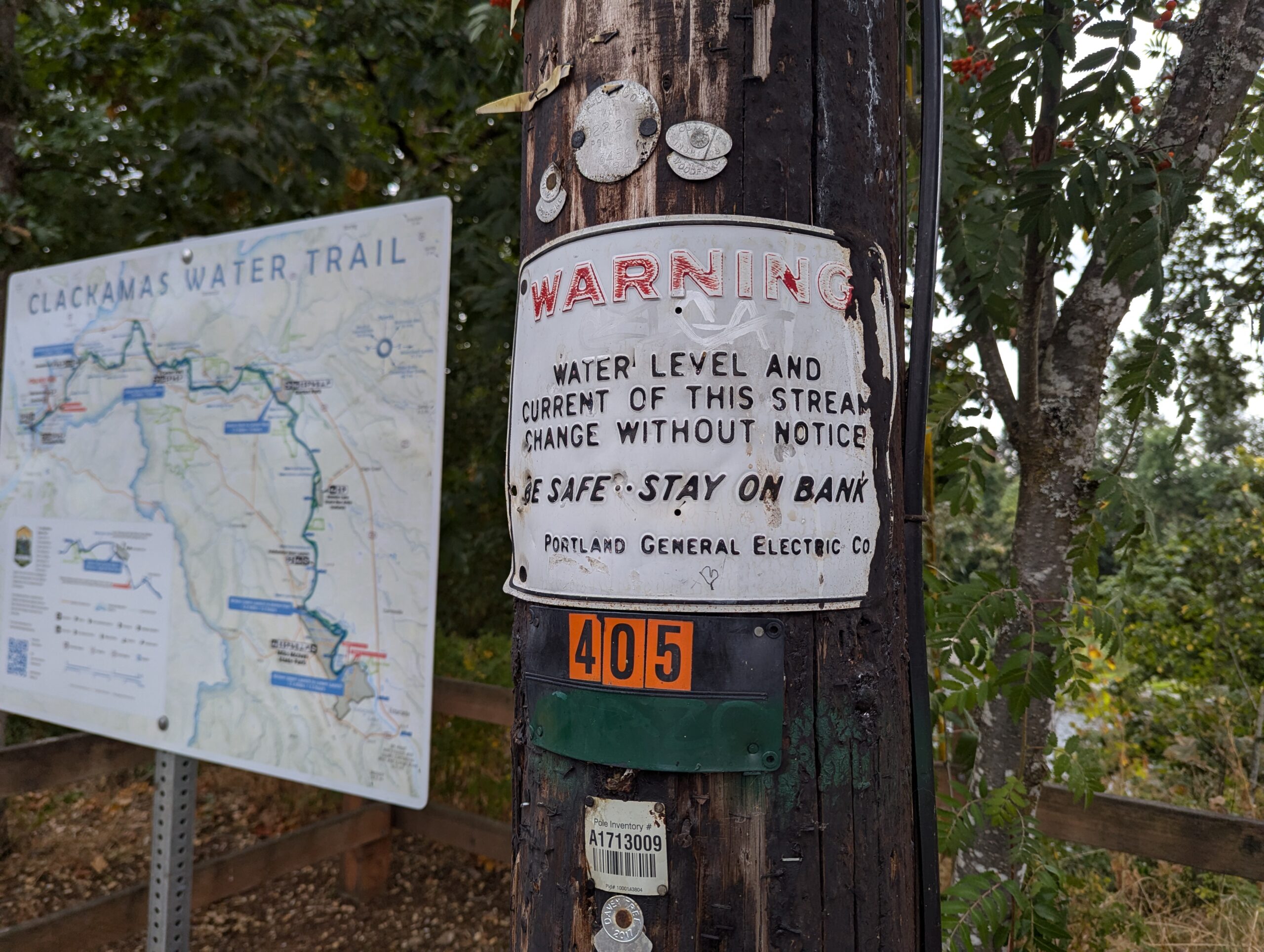 CWT next to old PGE sign warning of the dangers of the river (which are ever present and have not changed!).